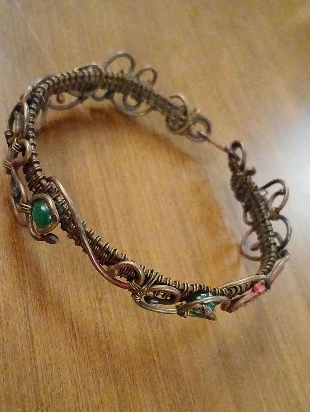 Handcrafted Wire-Wrapped Bracelet with Green And Red Accent Unique